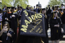 top of a graduation cap that says 3 majors a minor econ, poli sci, math thank you next