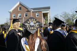 Rebecca Sheets shows off harry potter hat she made for graduation