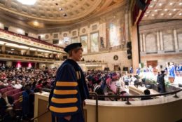 president mangelsdorf walking to stage in eastman theatre