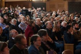 auditorium full of people during a talk