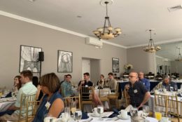 group seated at brunch tables