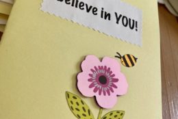 homemade greeting card with i believe in you and a butter fly and flower with bee