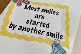 homemade greeting card that says most smiles are started by another smile