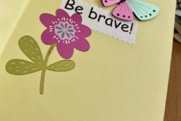 homemade greeting card that says be brave! and a butterfly and flower on it