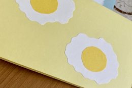 homemade greeting card with two sunny side up egg cutouts