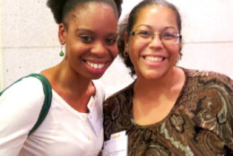 two women smiling for a photo