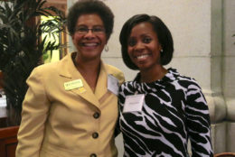 two women smiling for a photo