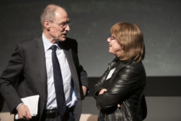 man and woman facing each other speaking