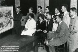 1929 black/white photo with teacher in front of students teaching anatomy
