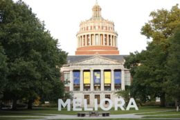 large meliora letters in quad in front of rush rhees library tower