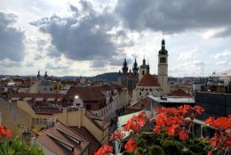 above a european city with cloudy sky