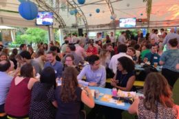 large event and crowd of people in a tent