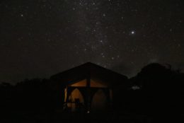 star filled night sky over house in tanzania