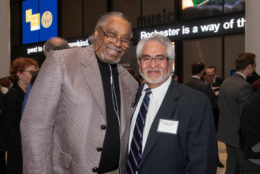 two men smiling for photo