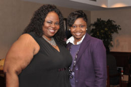 two women smiling for the photo