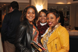 three women smiling for the photo