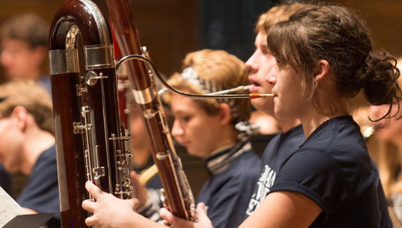 Student playing the bassoon in a orchestra