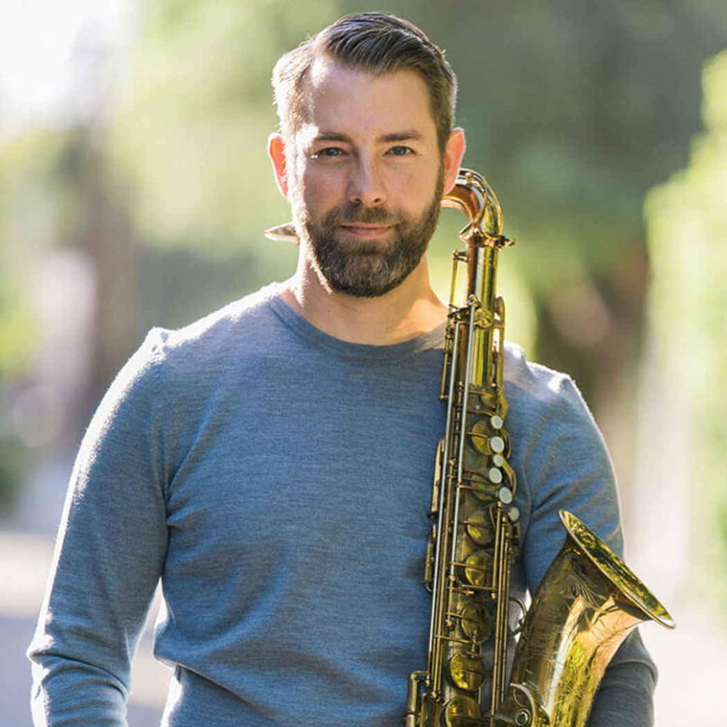 Jeff Pifher ’07E with his saxophone
