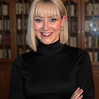 Headshot of Ashley Nevins. 