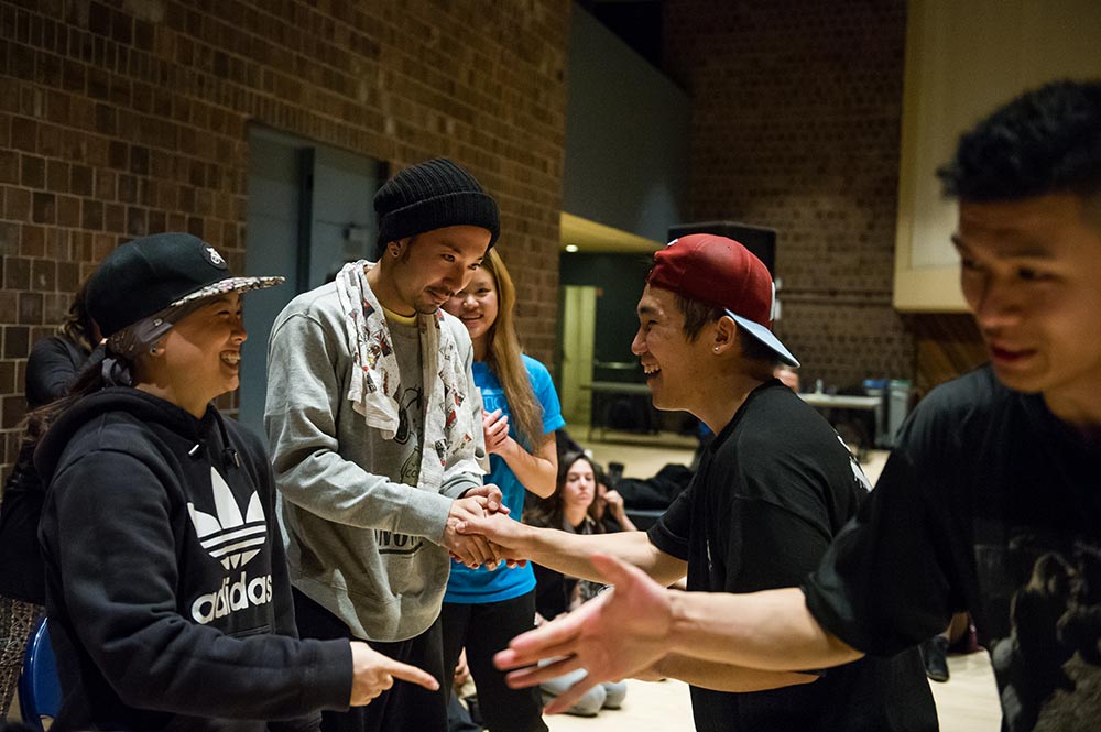 judges shake dancers' hands