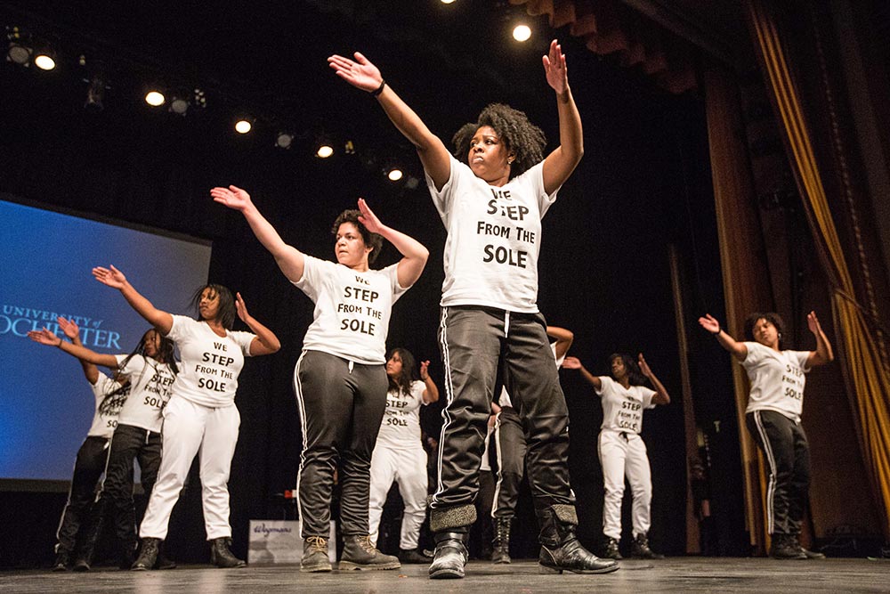 women dance on stage