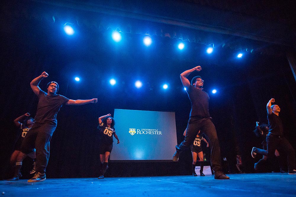 men dance on stage