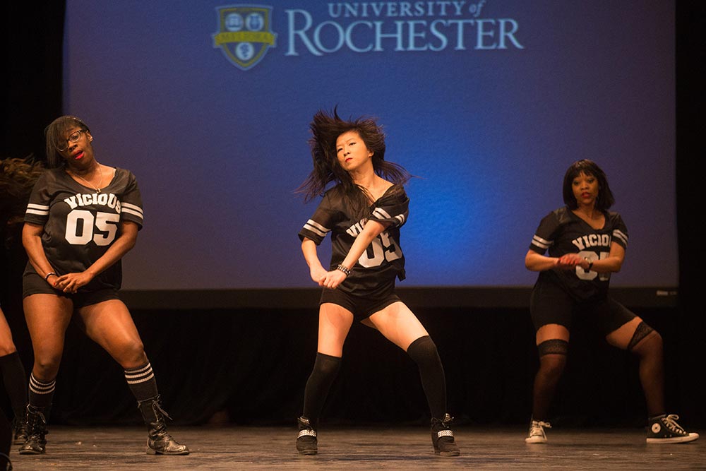 women dance on stage