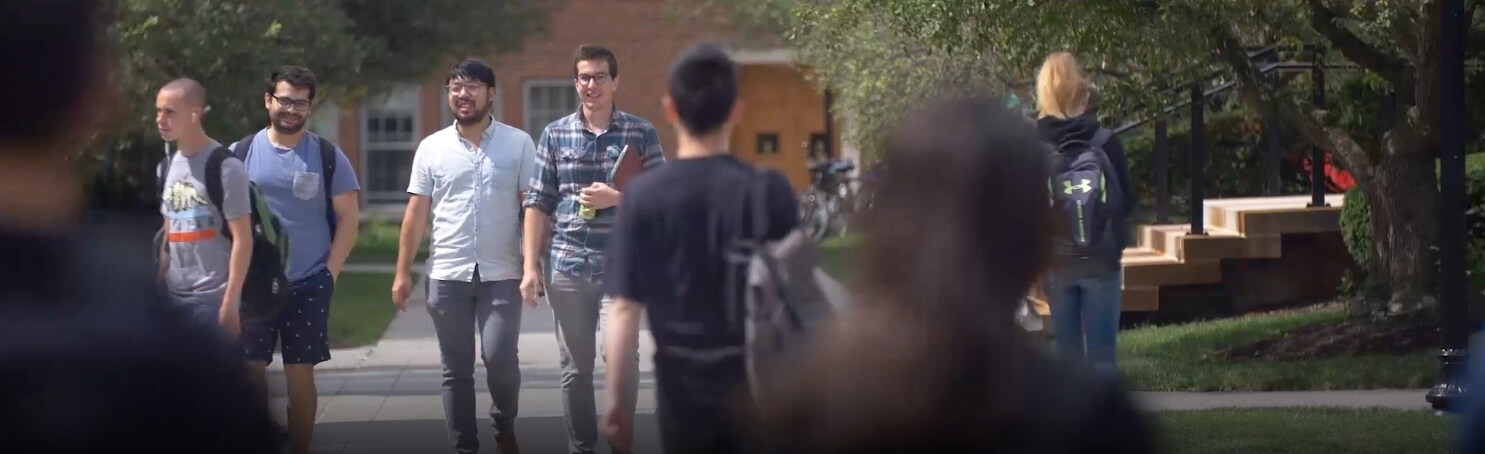 students walking across campus