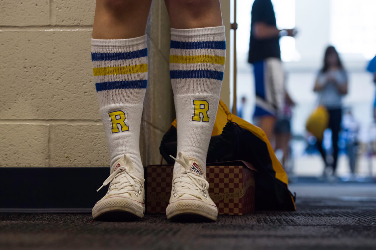 University of Rochester track athlete running in a race