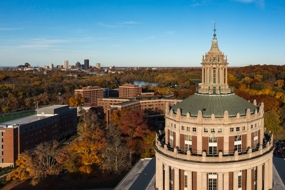 A panoramic view from the top of a building on the University of Rochester campus, showcasing the surrounding landscape.