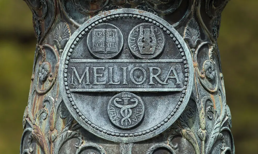 Meliora The seal on the flagpole base on University of Rochester's Eastman quad