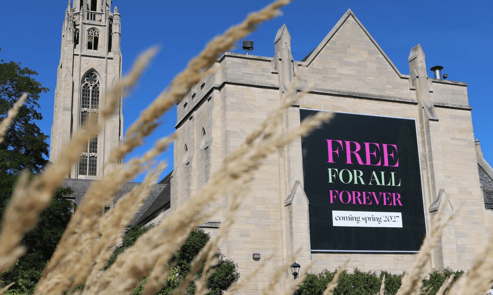 The Memorial Art Gallery exterior featuring a large banner that reads 'free for all forever; coming spring 2027'