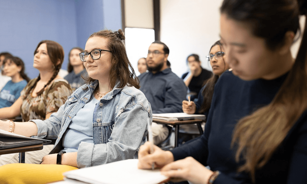 Students take notes during class.
