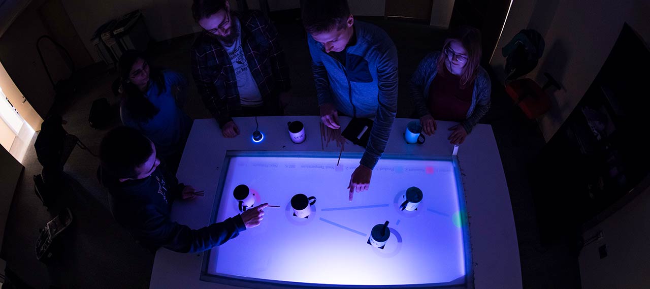 Students experiment with an augmented reality table.