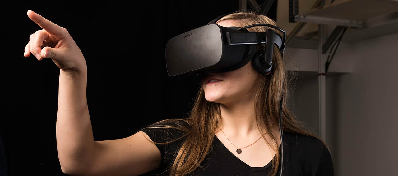 Co-founder of the University of Rochester student group NullSpace VR, models the Mark IIB prototype of their virtual reality suit.