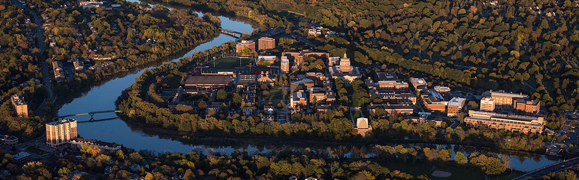 University of Rochester's River Campus is seen alongside the Genesee River in evening.