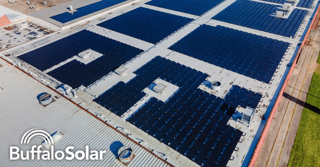 Solar panels on the rooftop of a building with the Buffalo Solar Logo in the bottom left corner