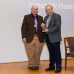 Mark Bocko posing with James McGrath who is holding his CEIS Partner Award.