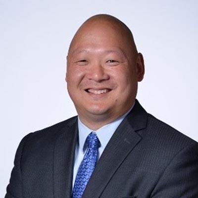 Headshot of Brad Rosenbaum.