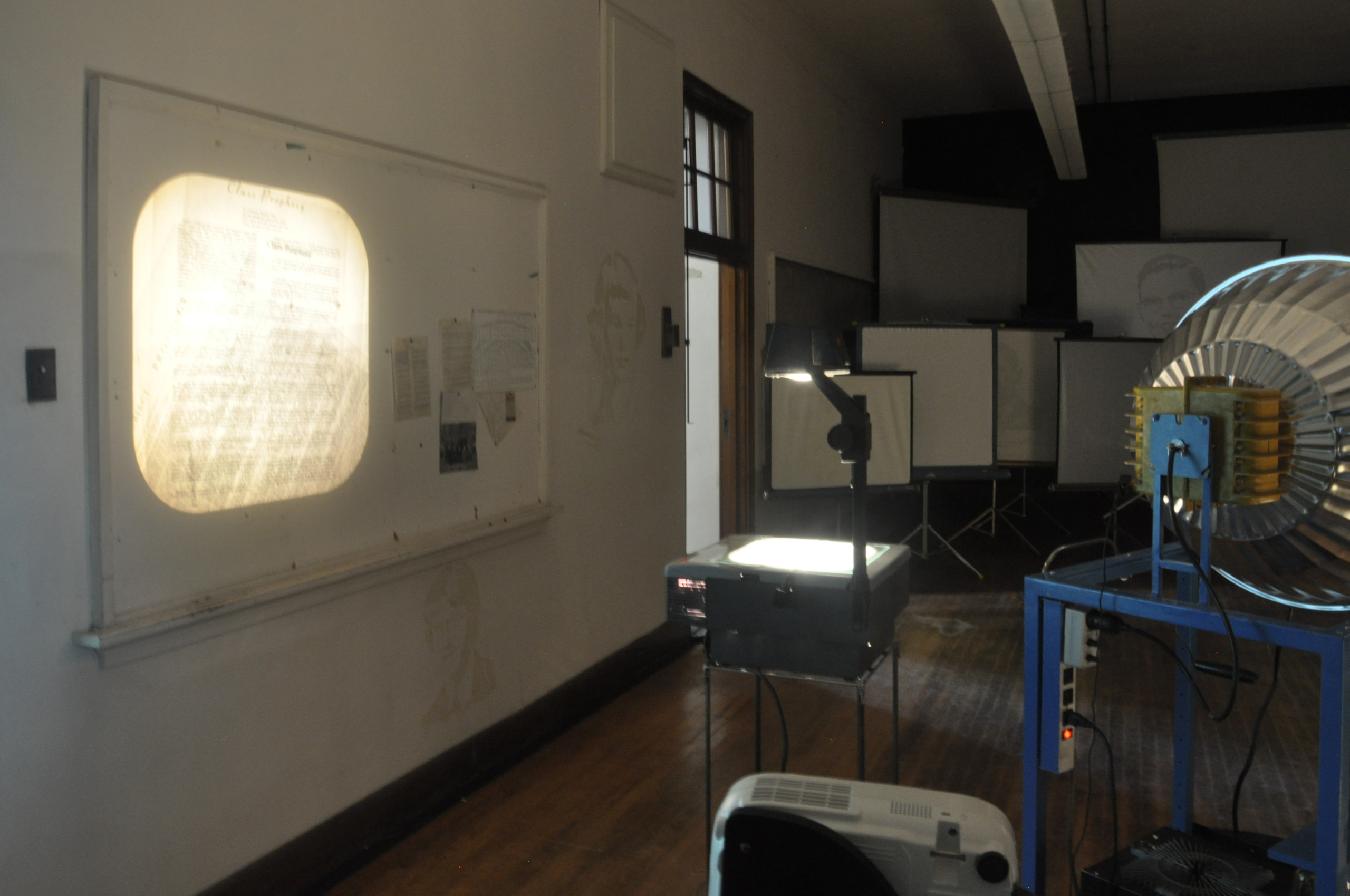 Installation detail with overhead projection (Stadium light off)