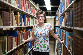 University of Rochester English major photographed in Rush Rhees Library.
