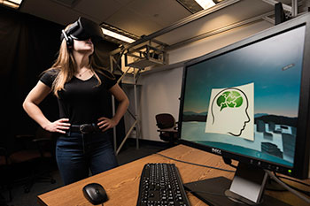 A student playing a virtual reality game