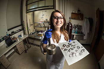 An engineering student working on a research project