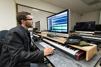 A student working in a music studio