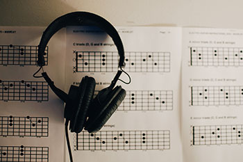Headphones and sheet music