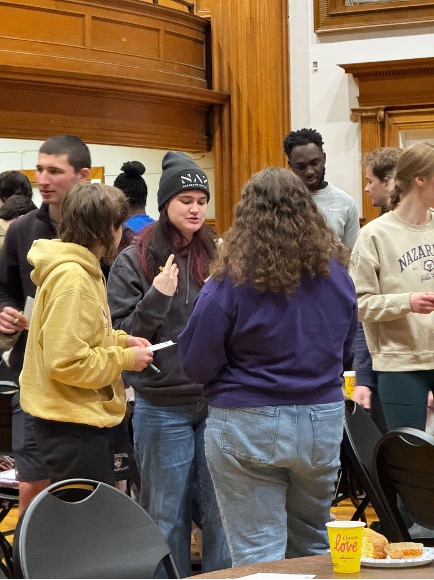 People speaking to each other.