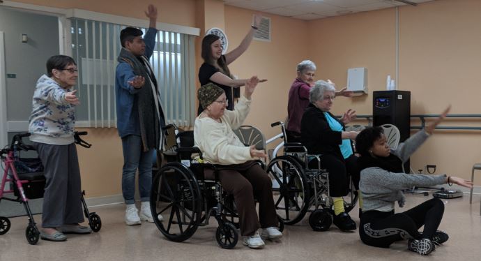 nursing home residents and UR undergraduates engage in physical movement together
