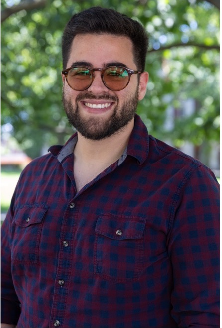 Ignacio smiling at the camera.