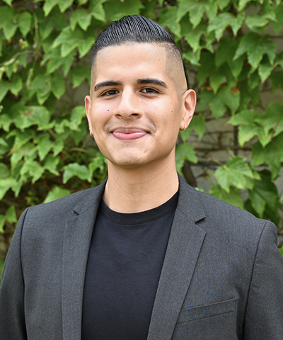 Headshot of Miguel Baique.