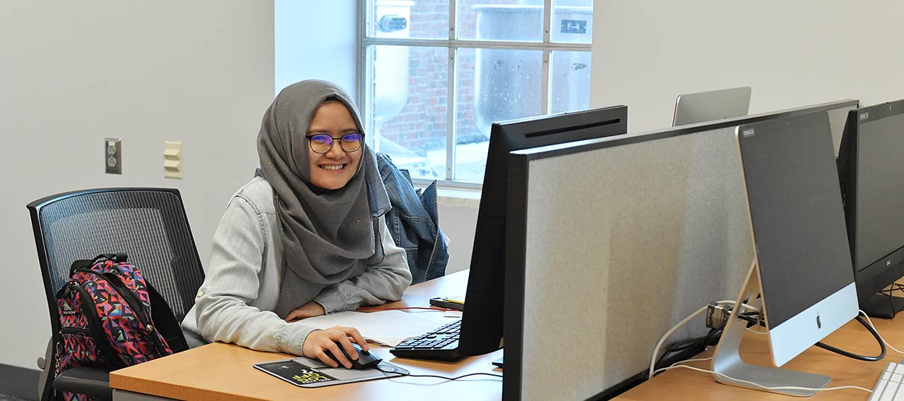 A student using a computer hub